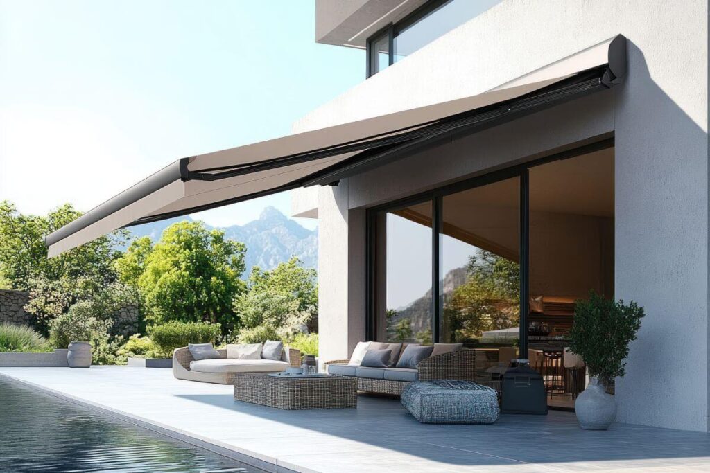 Nowoczesny taras z wygodnymi meblami i rozłożonymi markizami.